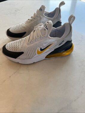 Nike Air Max 270 Sneaker in White, Black, Yellow.